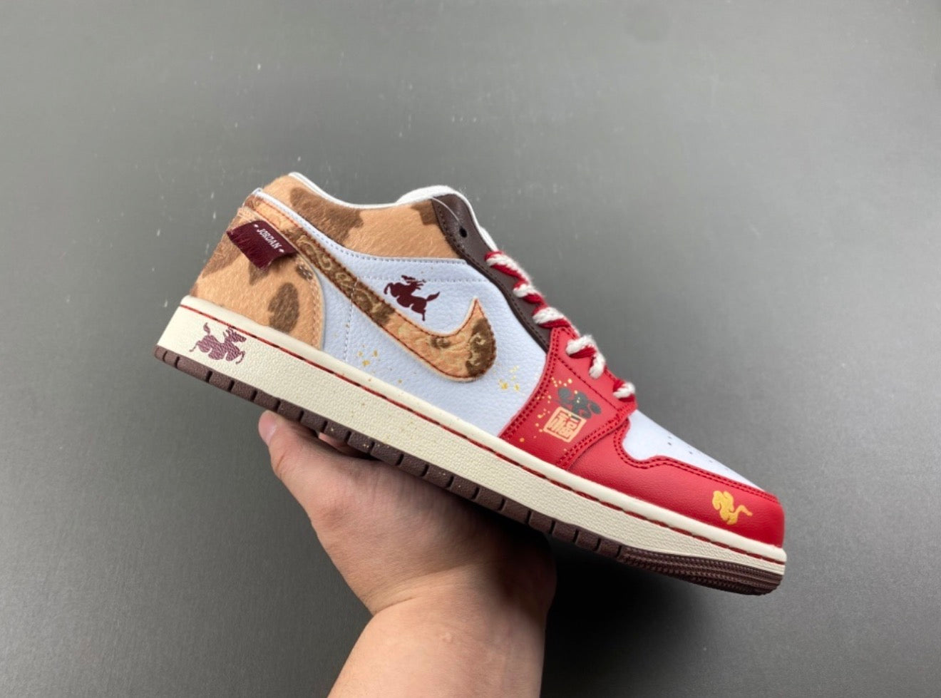 JORDAN 1 LOW TRAVIS SCOTT