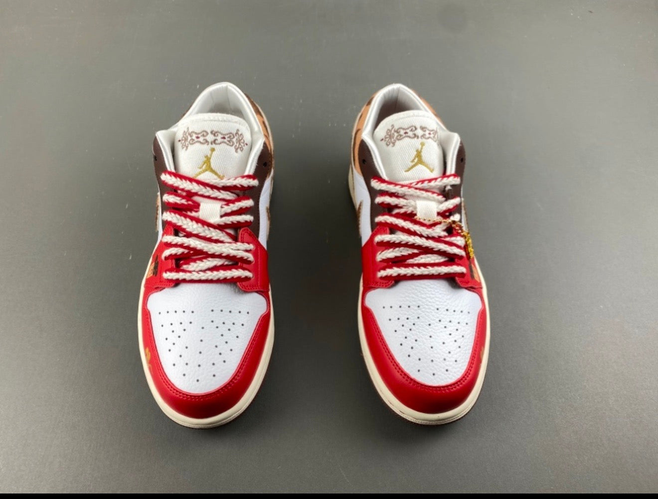 JORDAN 1 LOW TRAVIS SCOTT