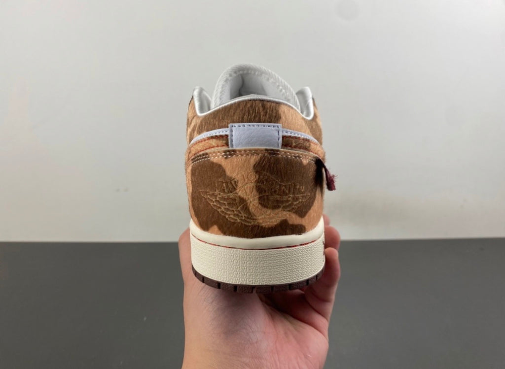 JORDAN 1 LOW TRAVIS SCOTT