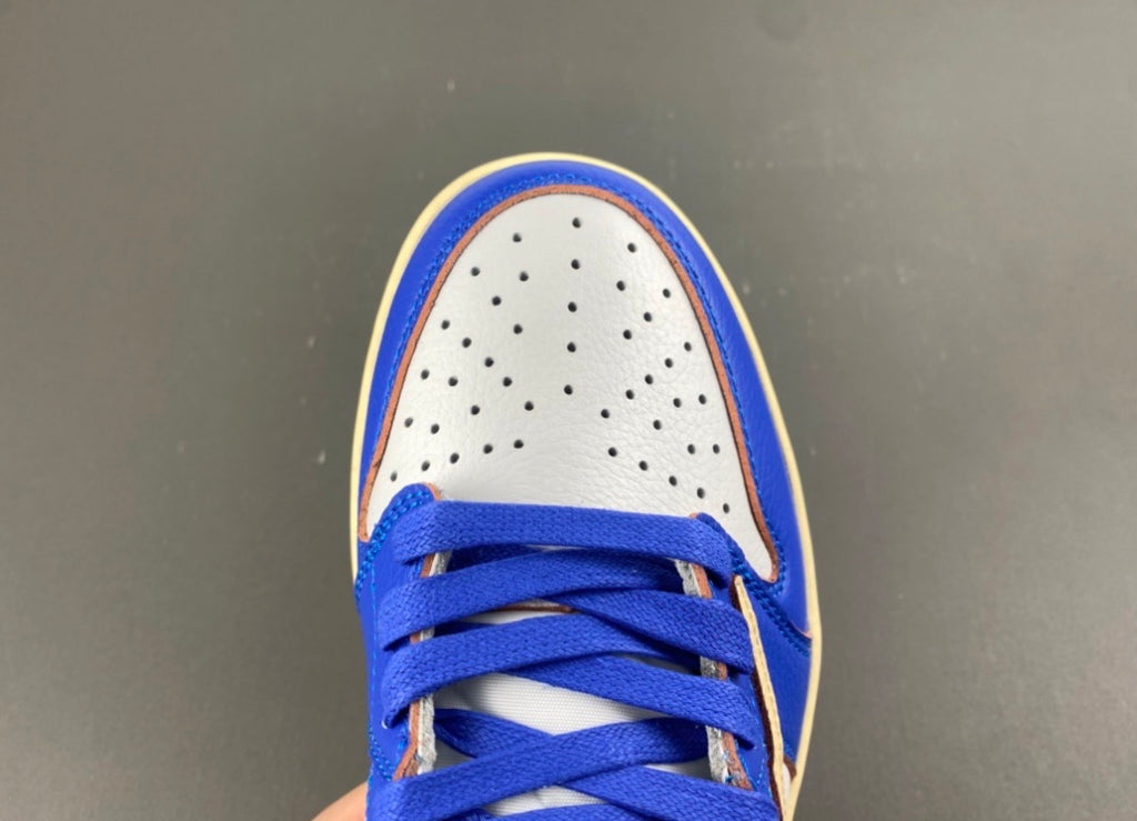 JORDAN 1 LOW TRAVIS SCOTT